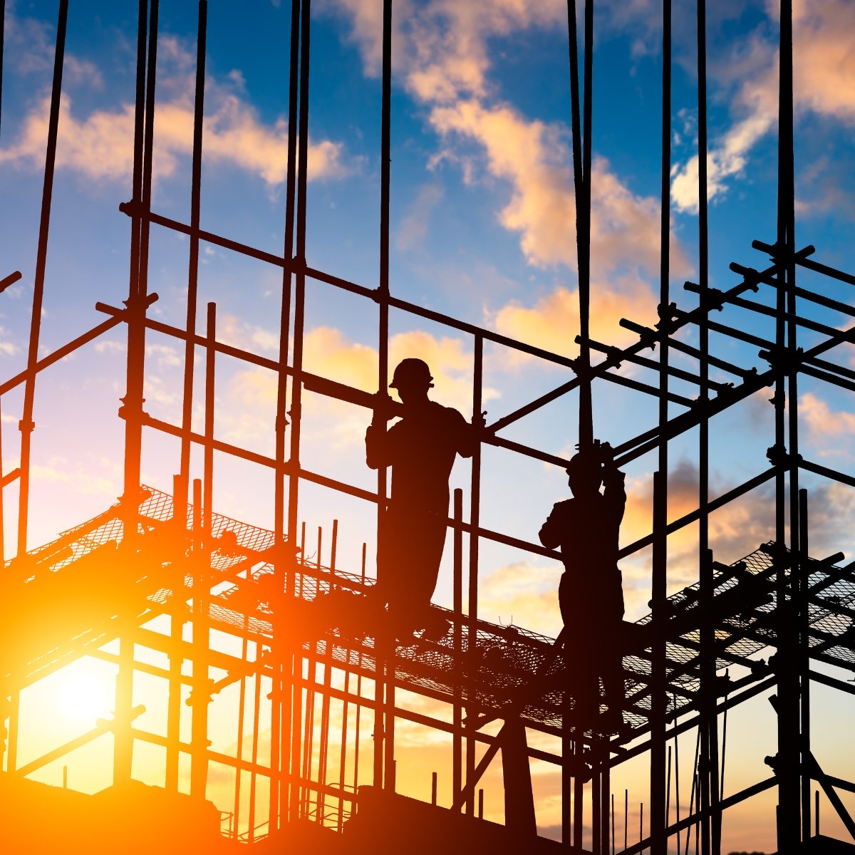 Construction workers on scaffolding