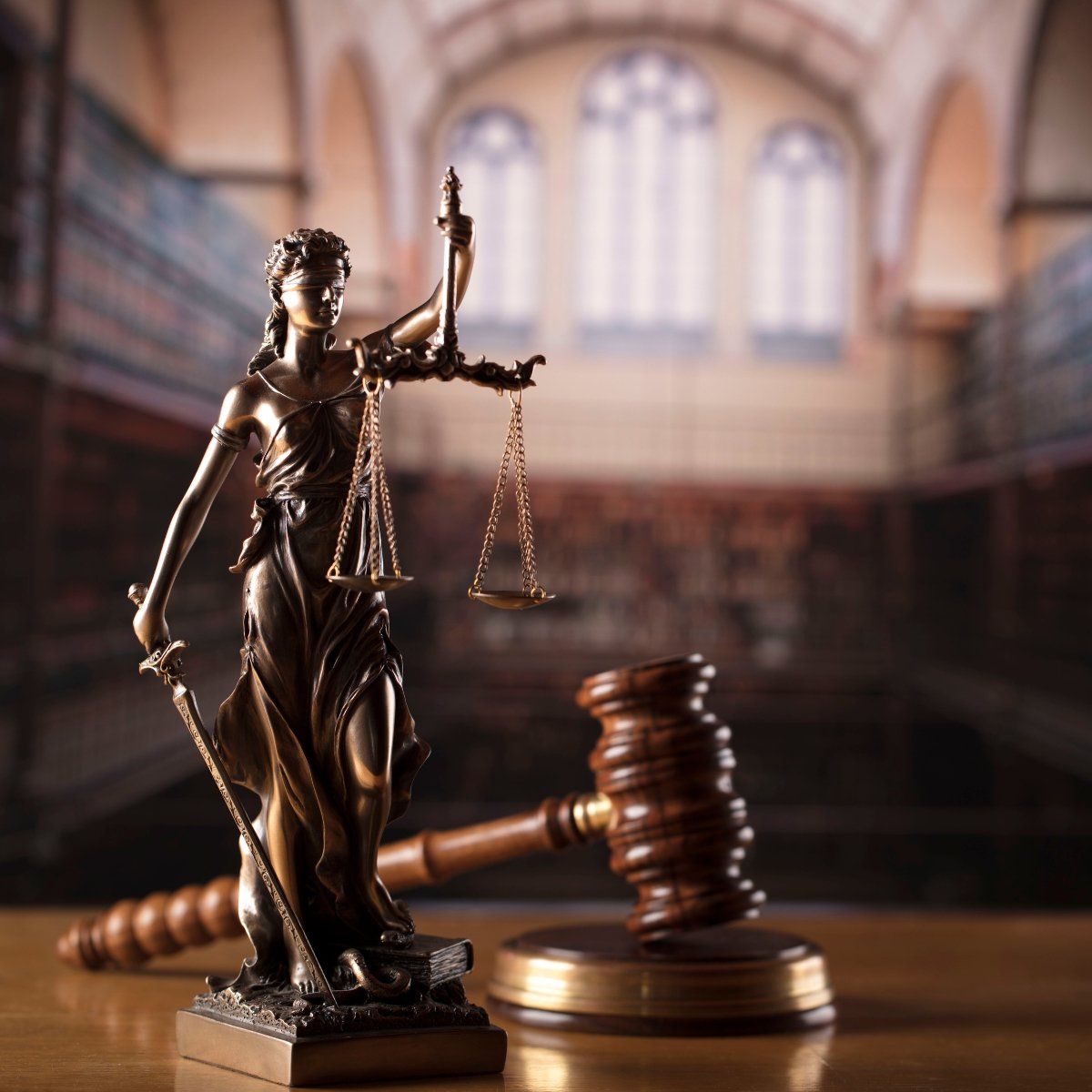Lady Justice statue and a judge's gavel